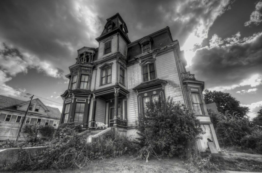 An eerie grayscale photo of the S.K. Pierce Mansion 