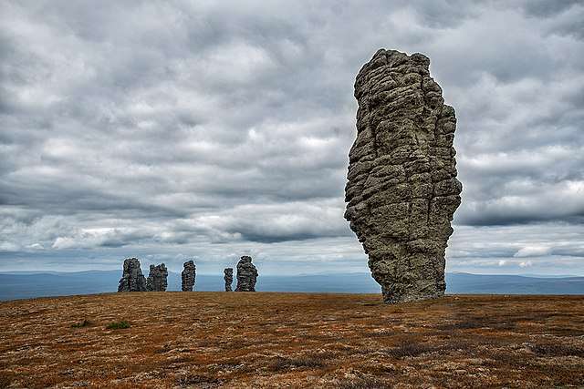 The Manpupuner Rock Formations rise from the ground