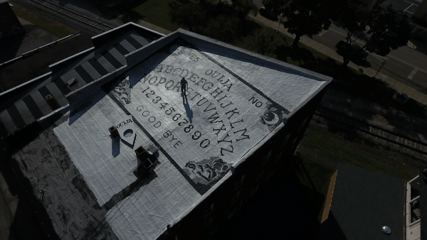 Aerial view of Ouija board atop hotel